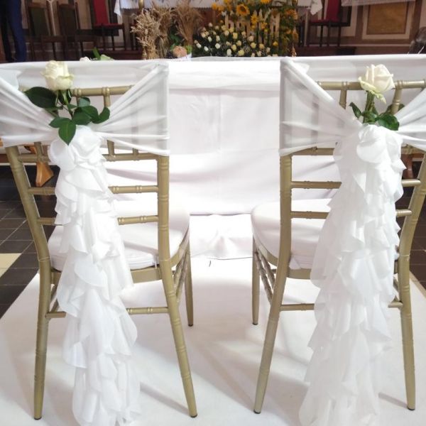 KOD 665<br><strong>DEKORACJA KRZESEŁ - FALBANA</strong><br>Ilość na stanie: 4</strong><br><strong>Cena wypożyczenia:  10 zł</strong>